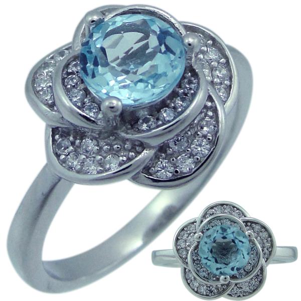Кольцо с топазом голубым природным и фианитом из Серебра